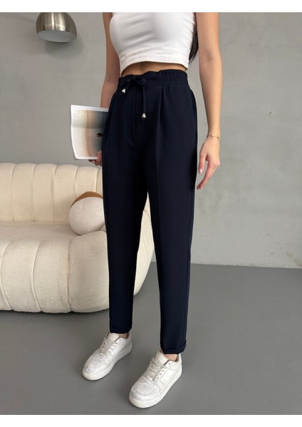 Kadın Yüksek Bel Lastikli ve Bağcıklı Havuç Kesim Kumaş Pantolon modelleri