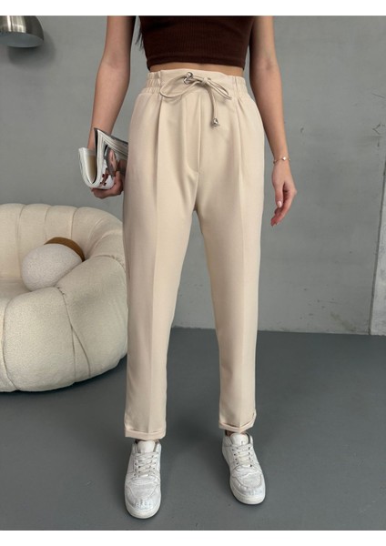 Kadın Yüksek Bel Lastikli ve Bağcıklı Havuç Kesim Kumaş Pantolon modelleri