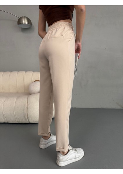 Kadın Yüksek Bel Lastikli ve Bağcıklı Havuç Kesim Kumaş Pantolon fırsatları