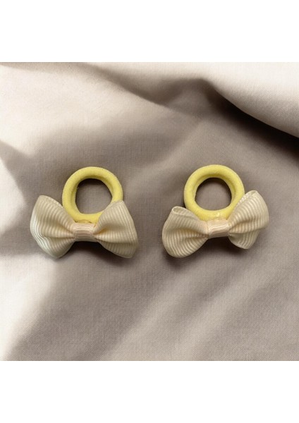 Fiyonk Desenli Bağlamalı Kız Çocuk Toka