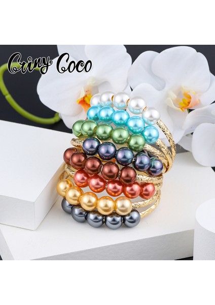 60MM Tarzı SL2171GOBE Cring Coco Bakır Bilezik Polinezya Mikronezya Hawai Takı Geleneksel 7 Renk Inci Bilezik Kadınlar Için (Yurt Dışından) fiyatları