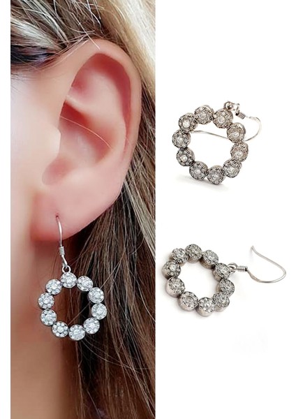 Pırlanta ışıltısında zirkon taşlı 925 ayar gümüş çiçek küpe