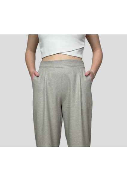 Kadın Bej Palazzo Yüksek Bel Pileli Cepli Bol Paça Pantolon fırsatları