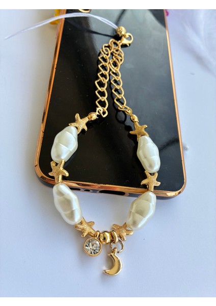 Altın Kaplama Yıldız ve Zincirli Parlak Taşlı Hilal Uçlu Incili Telefon ve Çanta ı modelleri