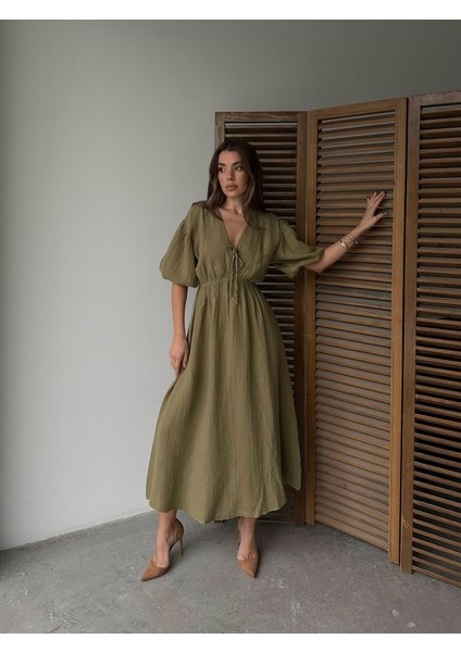 Haki - V Yaka Bağlamalı Müslin Kumaş Beli Lastikli Balon Kol Midi Elbise modelleri