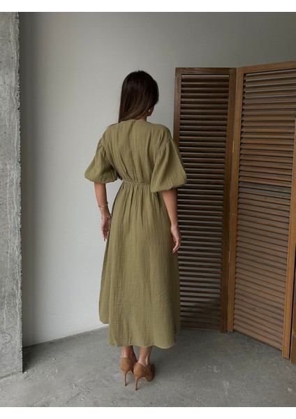 Haki - V Yaka Bağlamalı Müslin Kumaş Beli Lastikli Balon Kol Midi Elbise fırsatları