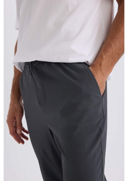 Relax Fit Rahat Kesim Düz Paça Krinkıl Yazlık Kumaş Pantolon indirimleri
