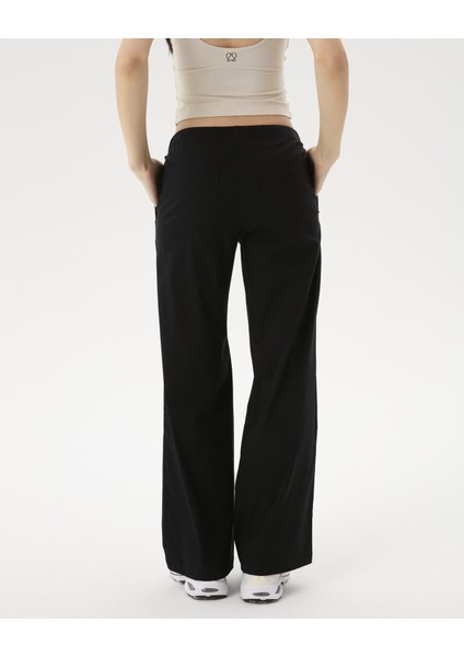 Kadın Siyah Bel Büzgülü Rahat Pantolon - Organik Pamuk, Bol Paça, Hafif ve Esnek Kumaş, Bel Büzgülü, Cepli, Günlük ve Ev Kullanımı İçin Konforlu Pantolon fiyatları