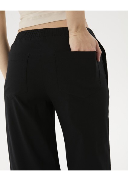 Kadın Siyah Bel Büzgülü Rahat Pantolon - Organik Pamuk, Bol Paça, Hafif ve Esnek Kumaş, Bel Büzgülü, Cepli, Günlük ve Ev Kullanımı İçin Konforlu Pantolon fırsatları