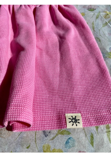 Kız Çocuk Fırfırlı Arkası Düğmeli Eteği Pileli Waffle Kumaş Pamuklu Pembe Renk Yazlık Elbise fırsatları