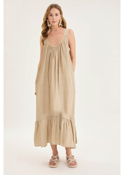 Sırtı Fiyonklu Cepli Keten Elbise