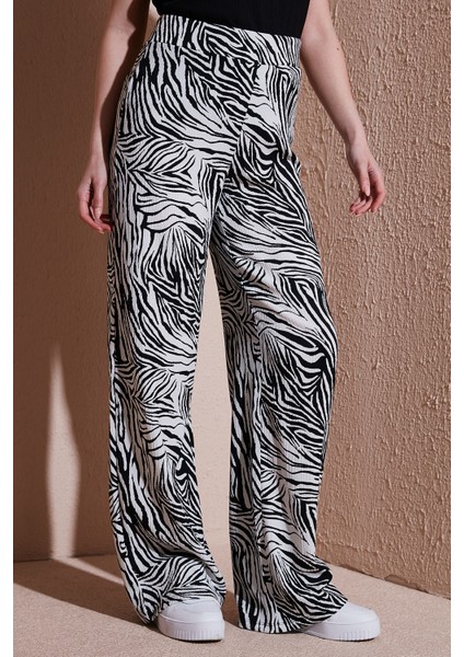 Desenli Regular Fit Yüksek Bel Bol Paça Pantolon Bayan Pantolon 25Y0179K1 modelleri