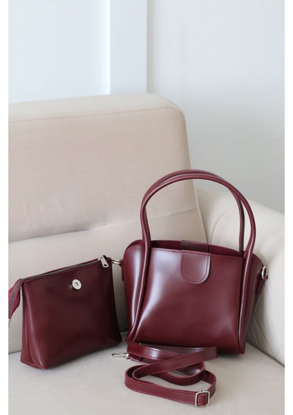 Kadın Bordo Deri Yavru Çantalı Çapraz Askılı Omuz Ve El Çantası indirimleri