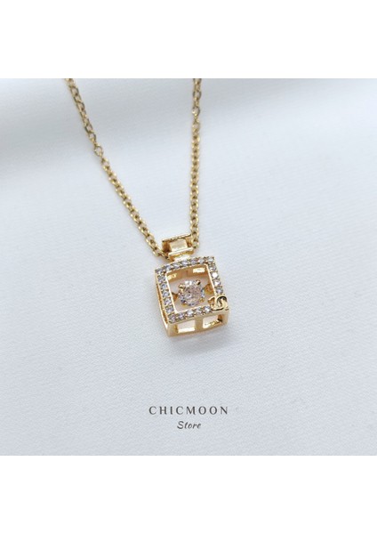 Çelik Altın Rengi Zirkon Taşlı Çerçeve Kolye