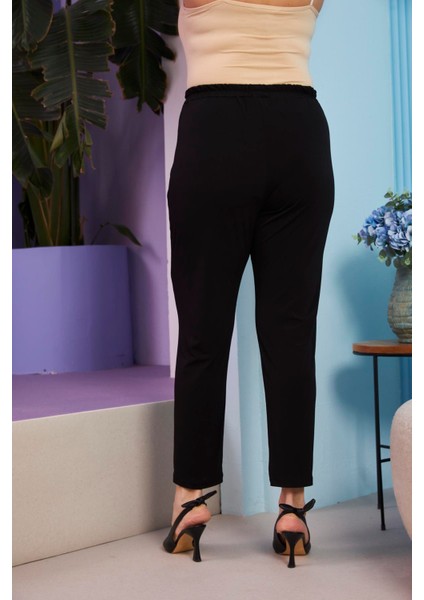 Beli Lastikli Boru Paça Büyük Beden Siyah Pantolon fırsatları
