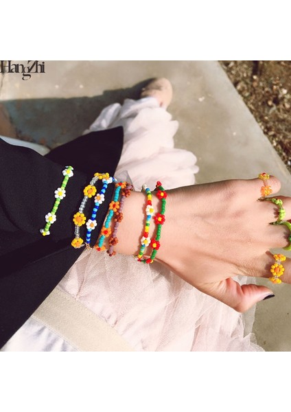 No.27 Boyutu Yeni Kore Sevimli Çiçekler Papatya Bilezikleri Şeffaf Renkli Boncuklu El Yapımı Elastik Bileklik Kadın Takı Için (Yurt Dışından) fiyatları