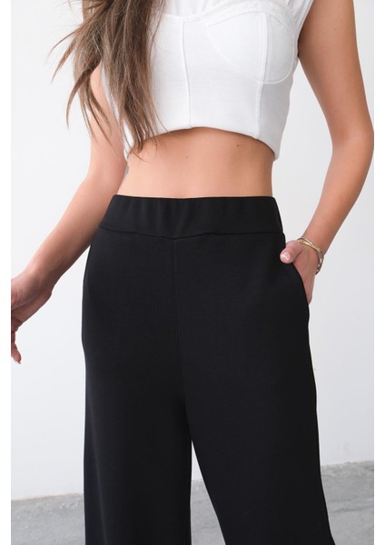 Kadın Beli Lastikli Rahat Kalıp Cepli Siyah Bol Paça Kadın Eşofman Altı modelleri