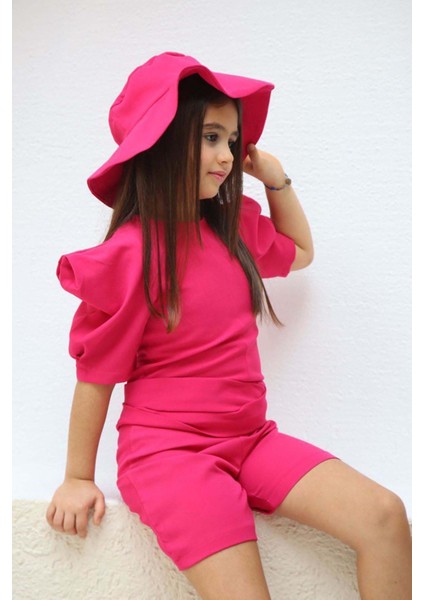 Kız Çocuk Bisiklet Yaka Yarım Kol Bel Bağlama Detaylı Fuşya Şortlu Tulum fırsatları