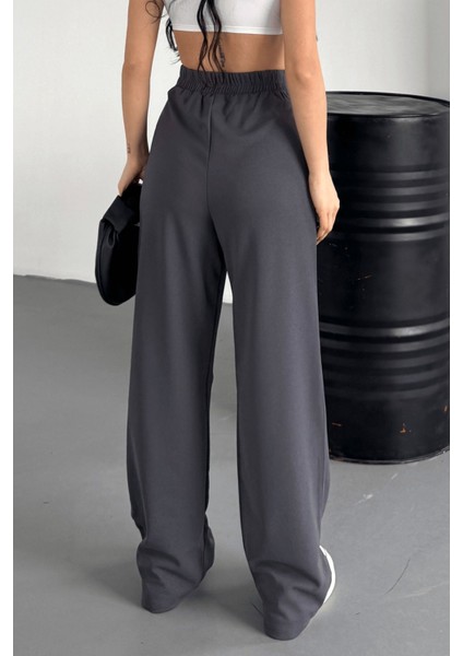 Kadın Sophia Yüksek Bel Arkası Lastikli Yan Gizli Fermuarlı Ispanyol Paça Kumaş Palazzo Pantolon fiyatları