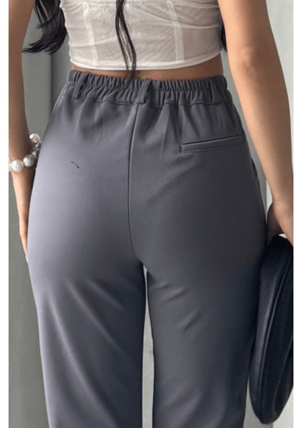 Kadın Elise Yüksek Bel Arkası Lastikli Dar Paça Toparlayıcı Likralı Kumaş Pantolon fırsatları