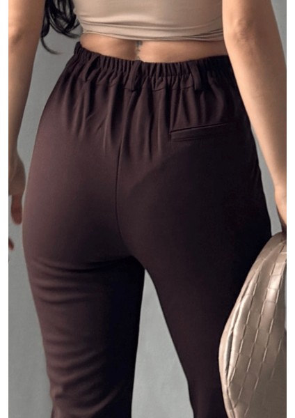 Kadın Elise Yüksek Bel Arkası Lastikli Dar Paça Toparlayıcı Likralı Kumaş Pantolon fırsatları