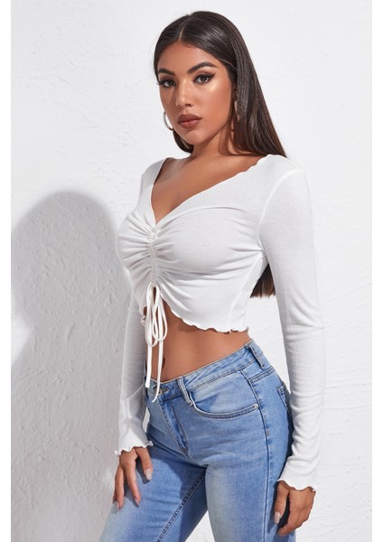 Kadın Beyaz Uzun Kollu Büzdürme Bağcık Detaylı Crop Top Bluz fırsatları