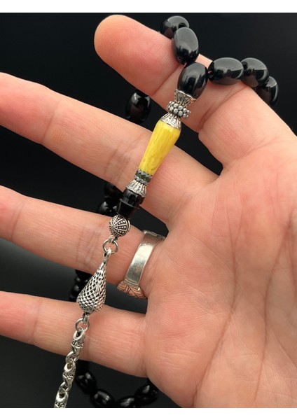 SK0250300.270425 Sıkma Kehribar Tesbih - Siyah Kapsül Kesim, Metal Püsküllü, 9X11 Mm, Koleksiyonluk modelleri