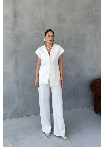 Ekru Gold Düğme Detaylı Asimetrik Kesim Yelek Pantolon Takım fiyatları