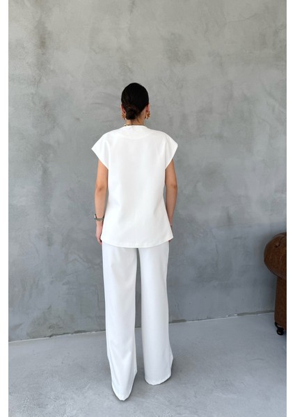 Ekru Gold Düğme Detaylı Asimetrik Kesim Yelek Pantolon Takım indirimleri