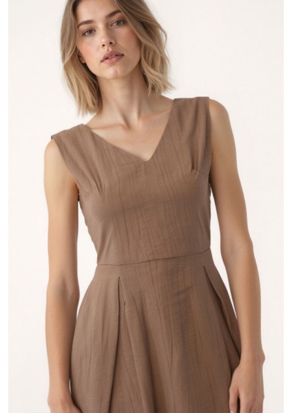 V Yaka Kuşaklı Krinkıl Kumaş Midi Elbise indirimleri