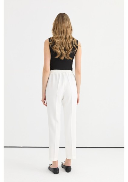 Beli Bağcıklı Boru Paça Pantolon fırsatları