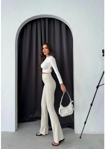 Toparlayıcı Özellikli Bej Yüksek Bel Boru Paça Slim Fit Şık Günlük Tayt Pantolon fırsatları