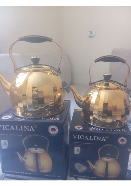 Sarı şık paslanmaz çaydanlık, estetik tasarım ve dayanıklı kullanım keyfi