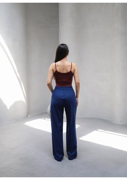 Arkasi Lasti̇kli̇ Pi̇leli̇ Dökümlü Wide Leg Pantolon