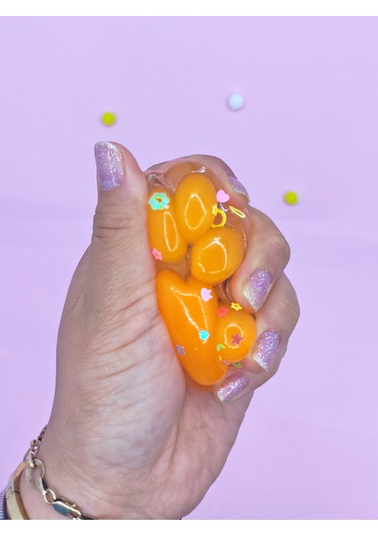 Işıklı Şeffaf Pati Squishy Pullu Yumuşacık 6 cm Pati Sukuşi - Turuncu