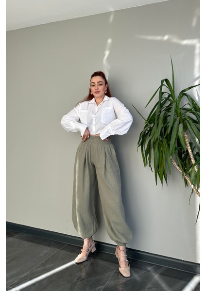 Beli ve Paçası Lastikli Yüksek Bel Yeşil Şalvar Kesim Pantolon fiyatları