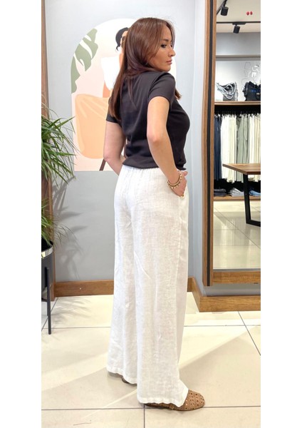 %100 Pamuk Keten Beli Lastikli ve Bağcıklı Geniş Paça Pantolon. fırsatları