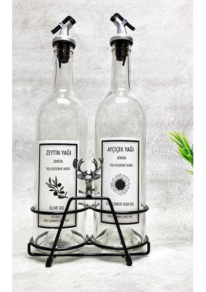 Siyah geyik figürlü kısa stand ve şeffaf 750 ml yağlık, etiketli, akıtıcılı, 2 renk bej