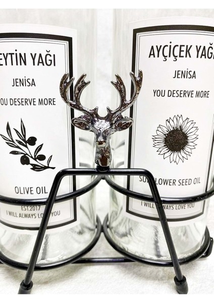 Siyah geyik figürlü kısa stand ve şeffaf 750 ml yağlık, etiketli, akıtıcılı, 2 renk bej