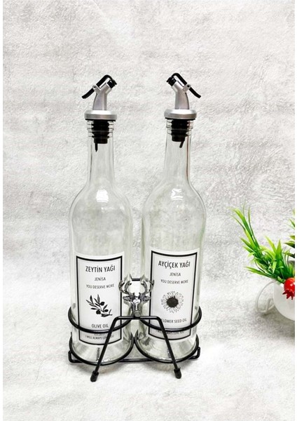 Siyah geyik figürlü kısa stand ve şeffaf 750 ml yağlık, etiketli, akıtıcılı, 2 renk bej