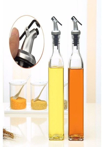 Şık ve kullanışlı 2'li cam yağdanlık seti, 500 ml hacimli, pratik kullanım sağlar.