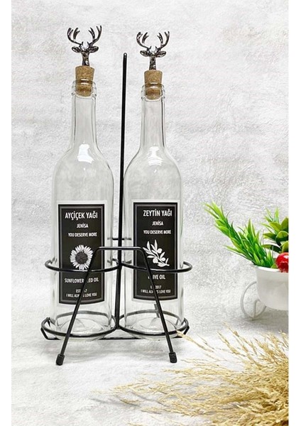 Şeffaf cam şişe 750 ml, mantar tıpalı, siyah stand, etiketli, bej renkli yağdanlık