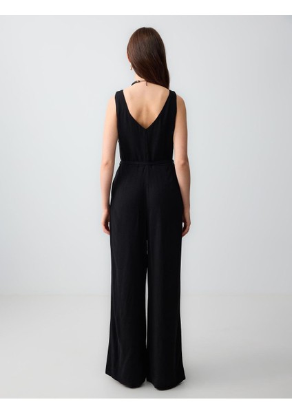 Siyah Düz Kesim Kemer Detaylı Kolsuz Dokuma Keten Tulum indirimleri