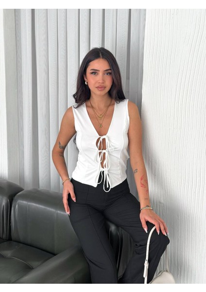 Önü Bağlama Detaylı Mikro Kumaşlı Crop Bluz fiyatları
