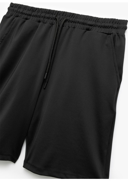 Beli Bağcıklı Cep Detaylı Oversize Bermuda Spor Şort