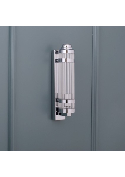 Modern şık krom metal duvar aydınlatması, zarif ve tarzınıza uygun tasarım.