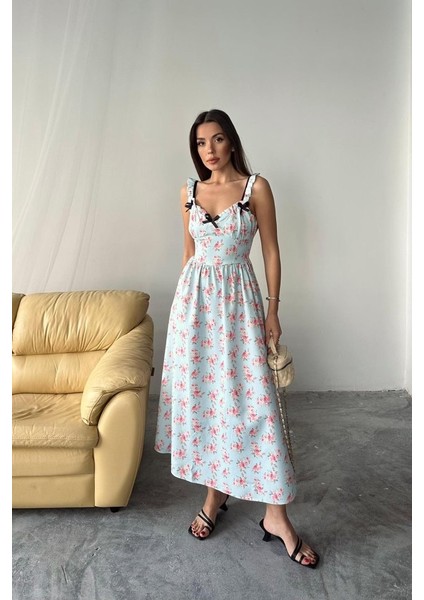 Bebe Mavi Önü Fiyonklu Çiçekli Elbise