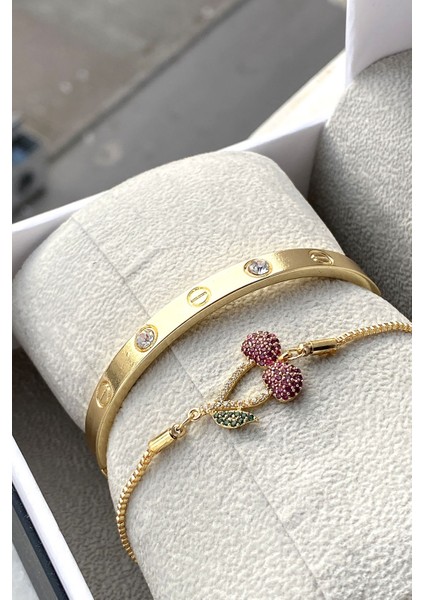 Gold Renk Kırmızı Zirkon Taşlı Asansörlü Kiraz Detay Bileklik ve Gold Kadın Kelepçe Bileklik Konbini fiyatları
