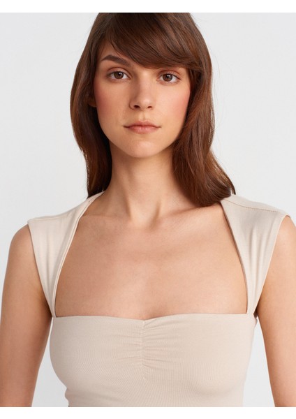 31780 Sırt Detaylı Top-Bej modelleri