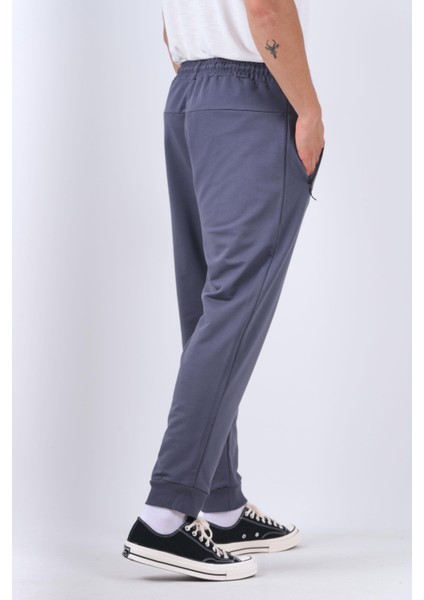 Erkek Dar Paça Regular Kalıp Pamuklu Ribanalı Füme Eşofman Altı fiyatları